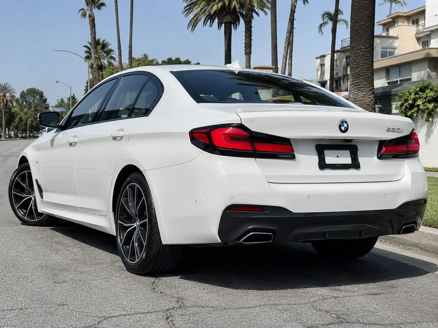 2023 BMW 5 Series rear_3q